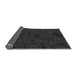 Thickness of Patterned Black Novelty Rug, pat535