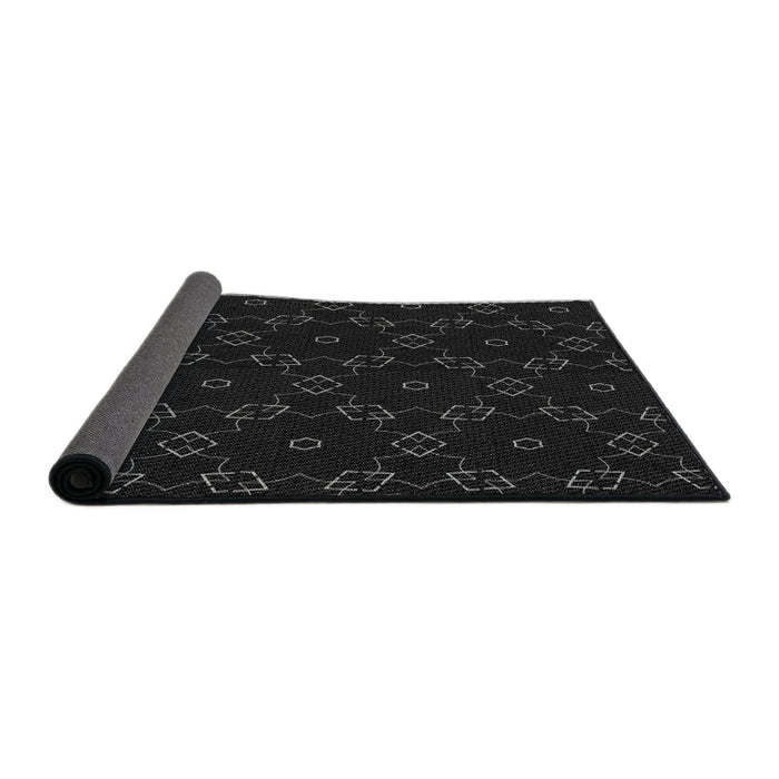 Thickness of Patterned Black Novelty Rug, pat557