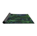 Thickness of Patterned Black Novelty Rug, pat610