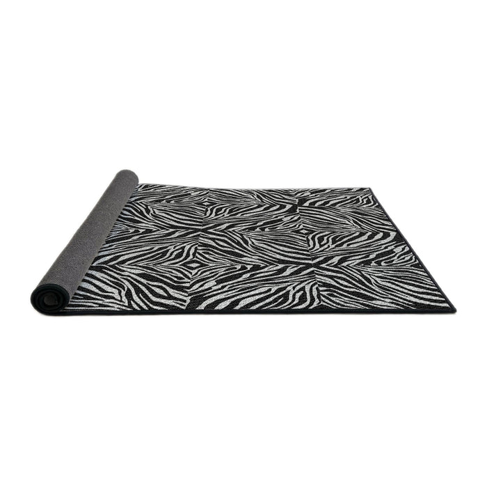 Thickness of Patterned Black Novelty Rug, pat970