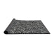 Thickness of Patterned Black Novelty Rug, pat970