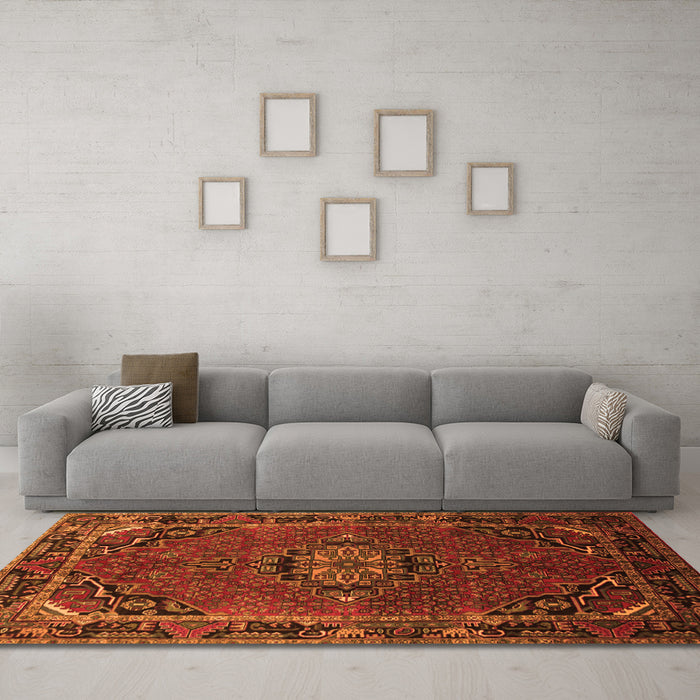 Machine Washable Medallion Orange Traditional Area Rugs in a Living Room, wshtr100org
