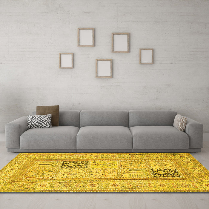 Machine Washable Persian Yellow Traditional Rug in a Living Room, wshtr1024yw
