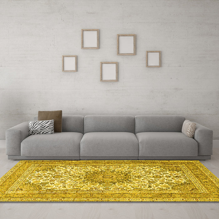 Machine Washable Medallion Yellow Traditional Rug in a Living Room, wshtr1050yw