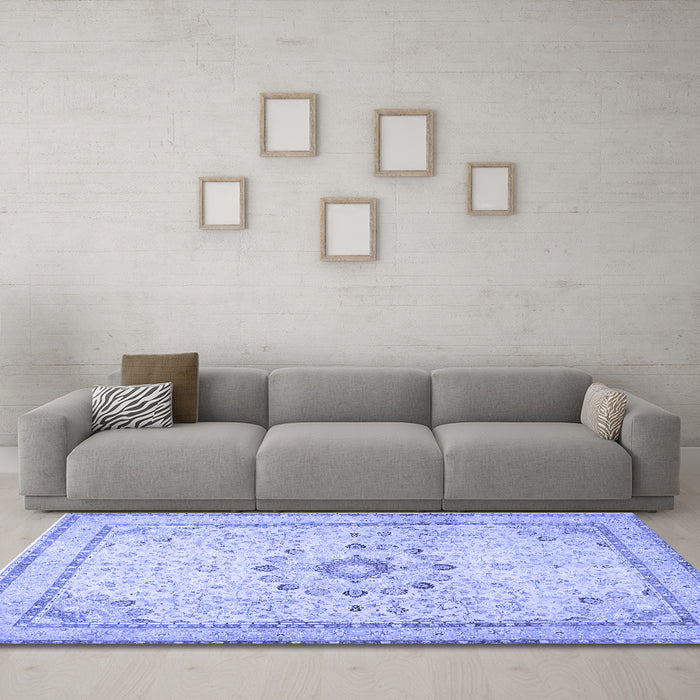 Machine Washable Medallion Blue Traditional Rug in a Living Room, wshtr1054blu