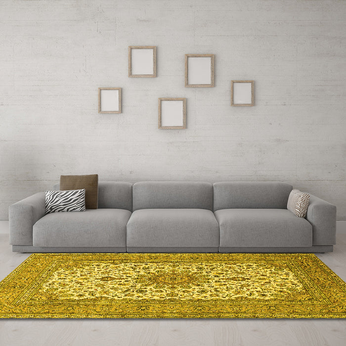 Machine Washable Medallion Yellow Traditional Rug in a Living Room, wshtr1065yw