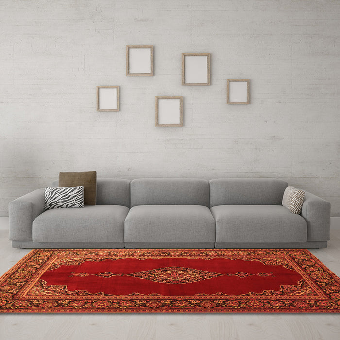 Machine Washable Medallion Orange Traditional Area Rugs in a Living Room, wshtr106org