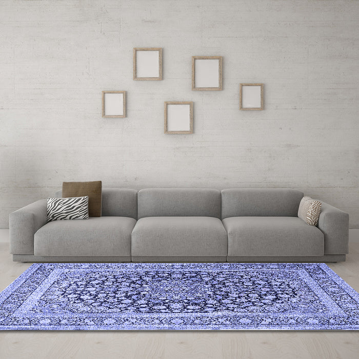 Machine Washable Medallion Blue Traditional Rug in a Living Room, wshtr1076blu