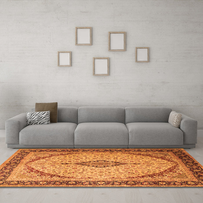 Machine Washable Medallion Orange Traditional Area Rugs in a Living Room, wshtr1118org