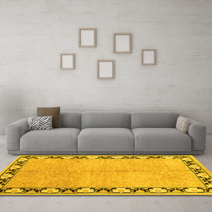 Machine Washable Persian Yellow Traditional Rug in a Living Room, wshtr1126yw