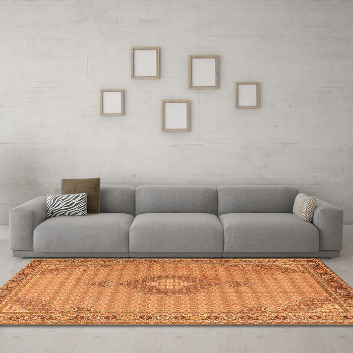 Machine Washable Medallion Orange Traditional Area Rugs in a Living Room, wshtr1173org