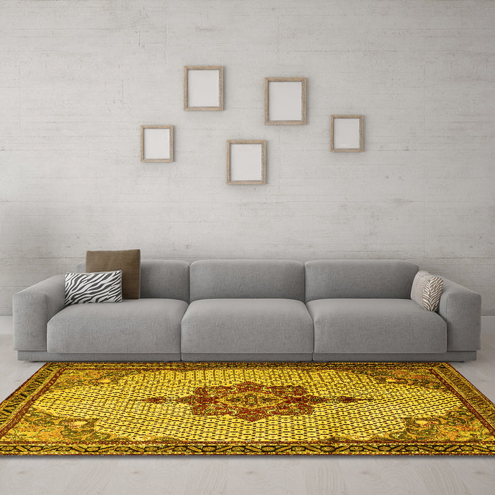 Machine Washable Persian Yellow Traditional Rug in a Living Room, wshtr1193yw