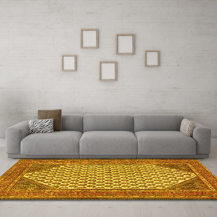 Machine Washable Persian Yellow Traditional Rug in a Living Room, wshtr1290yw