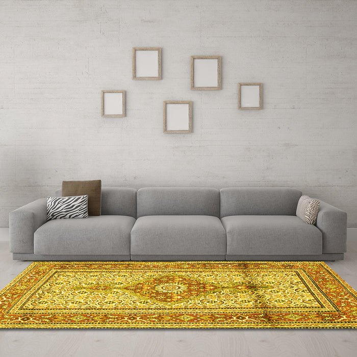 Machine Washable Medallion Yellow Traditional Rug in a Living Room, wshtr1304yw