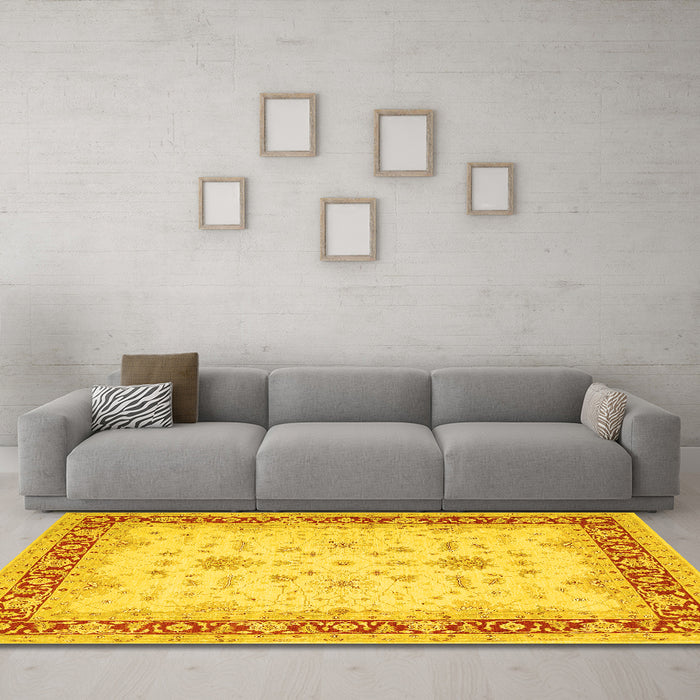 Machine Washable Oriental Yellow Traditional Rug in a Living Room, wshtr1316yw
