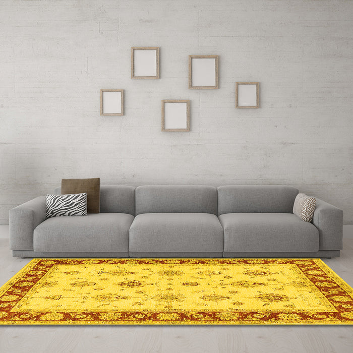 Machine Washable Persian Yellow Traditional Rug in a Living Room, wshtr1327yw