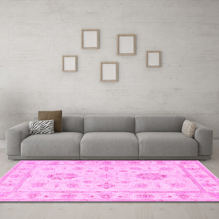 Machine Washable Oriental Pink Traditional Rug in a Living Room, wshtr1330pnk
