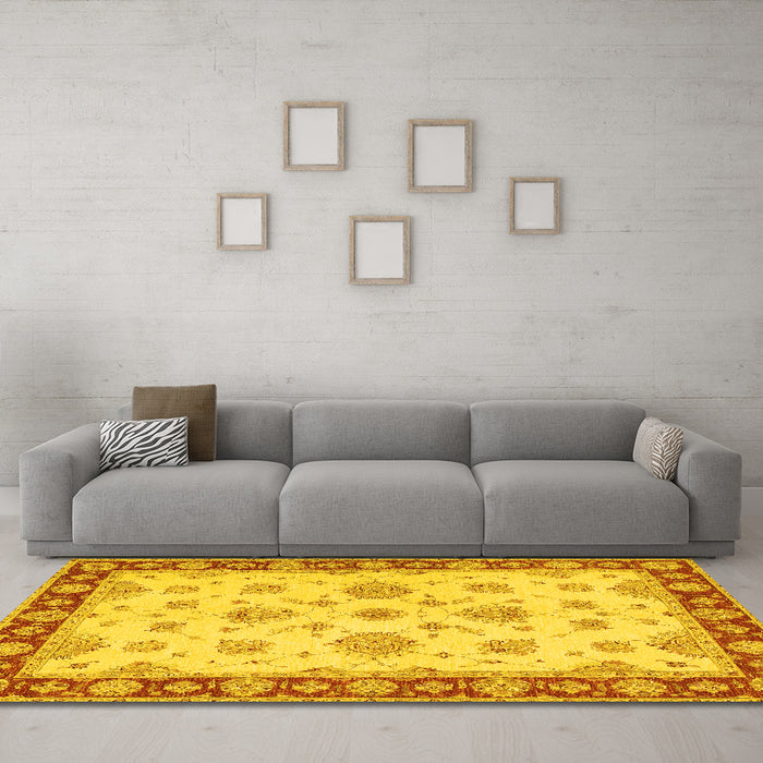 Machine Washable Oriental Yellow Traditional Rug in a Living Room, wshtr1345yw