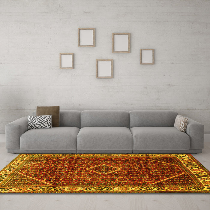 Machine Washable Persian Yellow Traditional Rug in a Living Room, wshtr1392yw