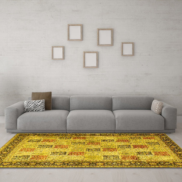 Machine Washable Persian Yellow Traditional Rug in a Living Room, wshtr1431yw