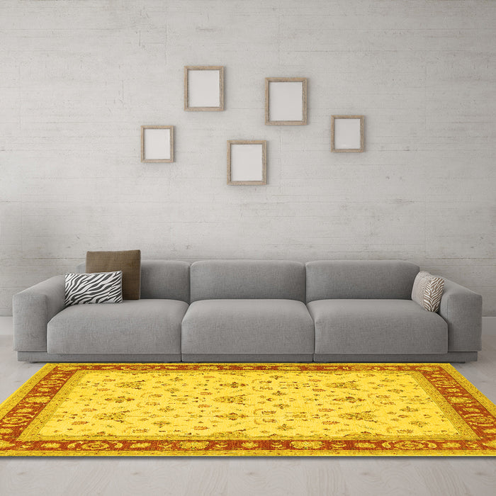 Machine Washable Persian Yellow Traditional Rug in a Living Room, wshtr1446yw