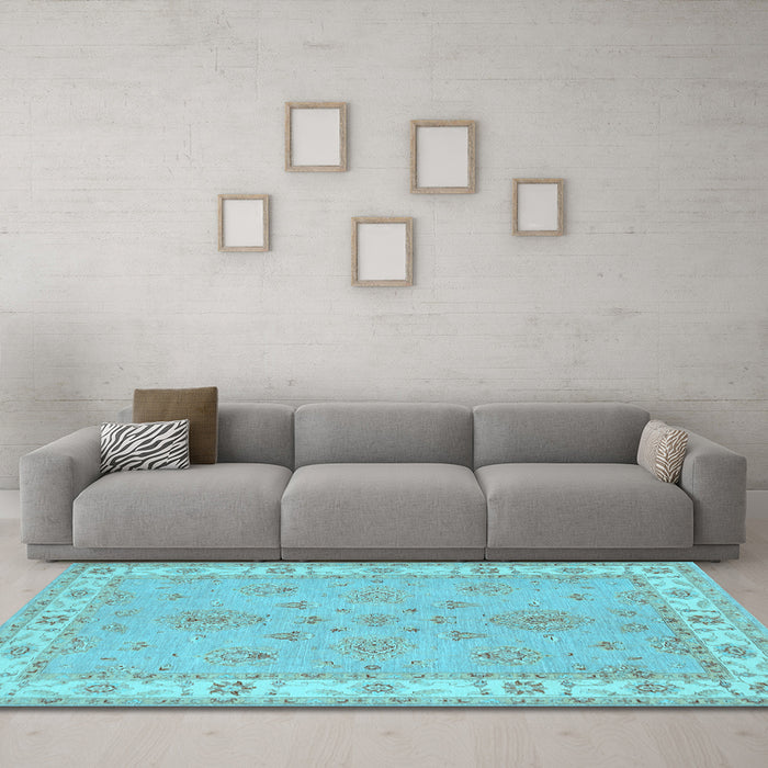 Machine Washable Oriental Light Blue Traditional Rug in a Living Room, wshtr1469lblu