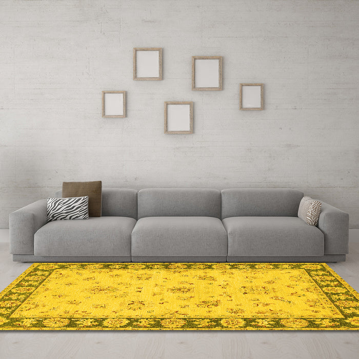 Machine Washable Oriental Yellow Traditional Rug in a Living Room, wshtr1508yw