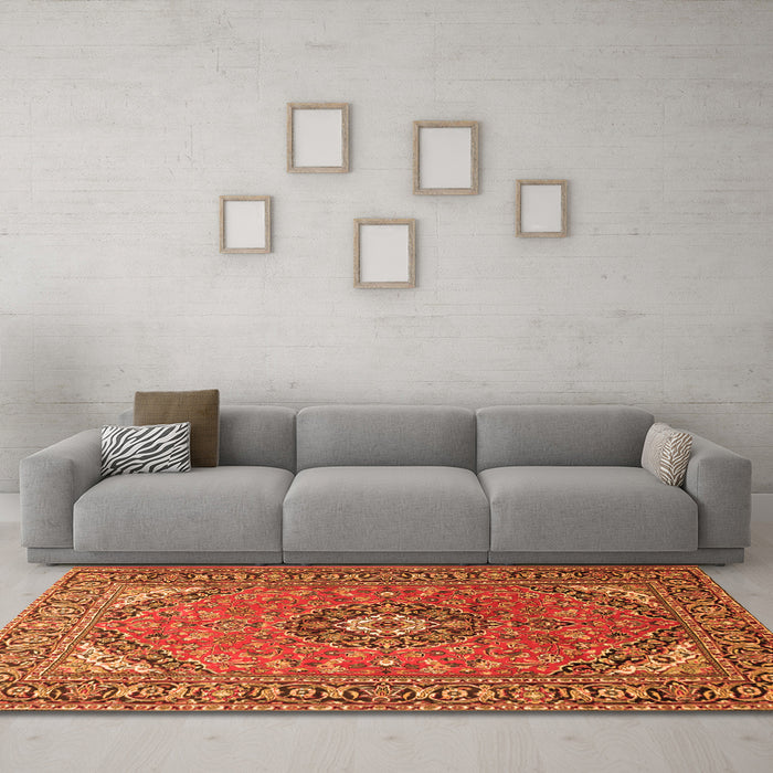 Machine Washable Medallion Orange Traditional Area Rugs in a Living Room, wshtr1511org