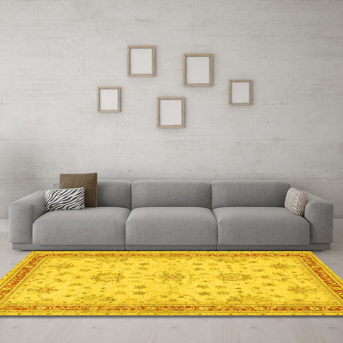 Machine Washable Oriental Yellow Traditional Rug in a Living Room, wshtr1517yw