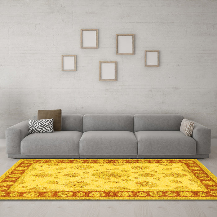 Machine Washable Oriental Yellow Traditional Rug in a Living Room, wshtr1518yw