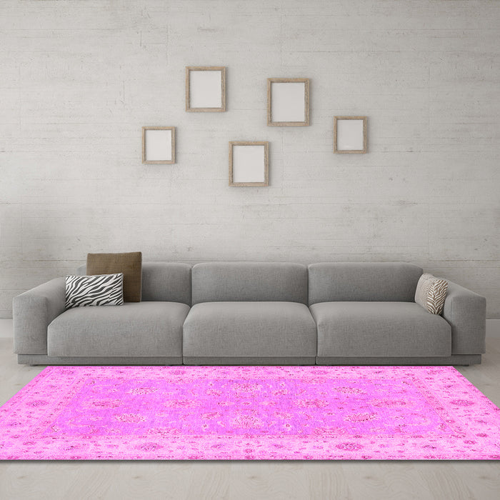 Machine Washable Oriental Pink Traditional Rug in a Living Room, wshtr1560pnk