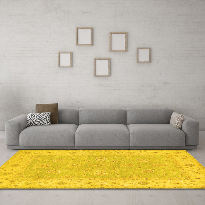 Machine Washable Oriental Yellow Traditional Rug in a Living Room, wshtr1560yw