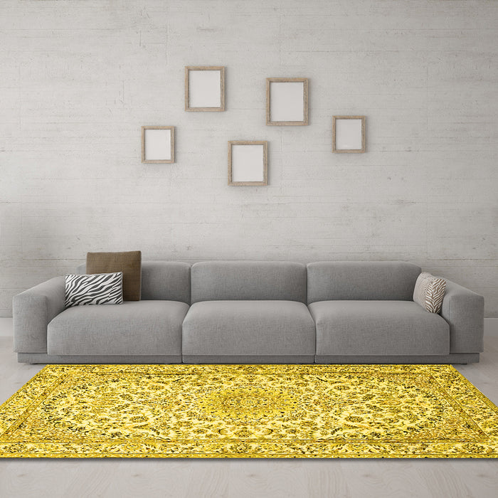Machine Washable Medallion Yellow Traditional Rug in a Living Room, wshtr1587yw