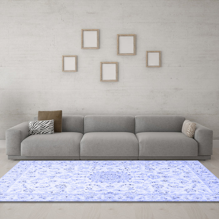 Machine Washable Medallion Blue Traditional Rug in a Living Room, wshtr1589blu