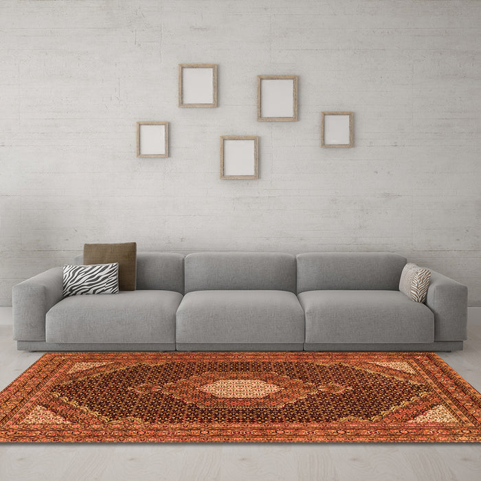 Machine Washable Medallion Orange Traditional Area Rugs in a Living Room, wshtr1623org