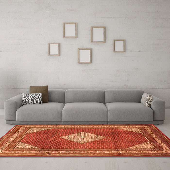 Machine Washable Medallion Orange Traditional Area Rugs in a Living Room, wshtr1626org