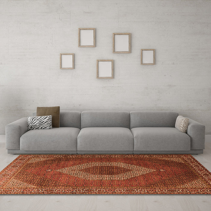 Machine Washable Medallion Orange Traditional Area Rugs in a Living Room, wshtr1669org