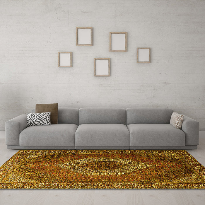 Machine Washable Medallion Yellow Traditional Rug in a Living Room, wshtr1669yw