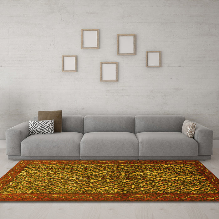 Machine Washable Persian Yellow Traditional Rug in a Living Room, wshtr1737yw