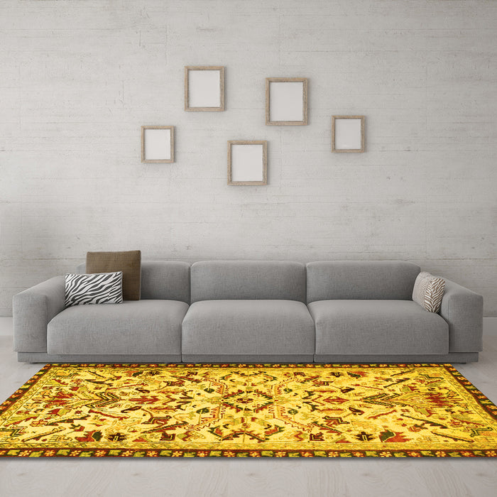 Machine Washable Animal Yellow Traditional Rug in a Living Room, wshtr1841yw