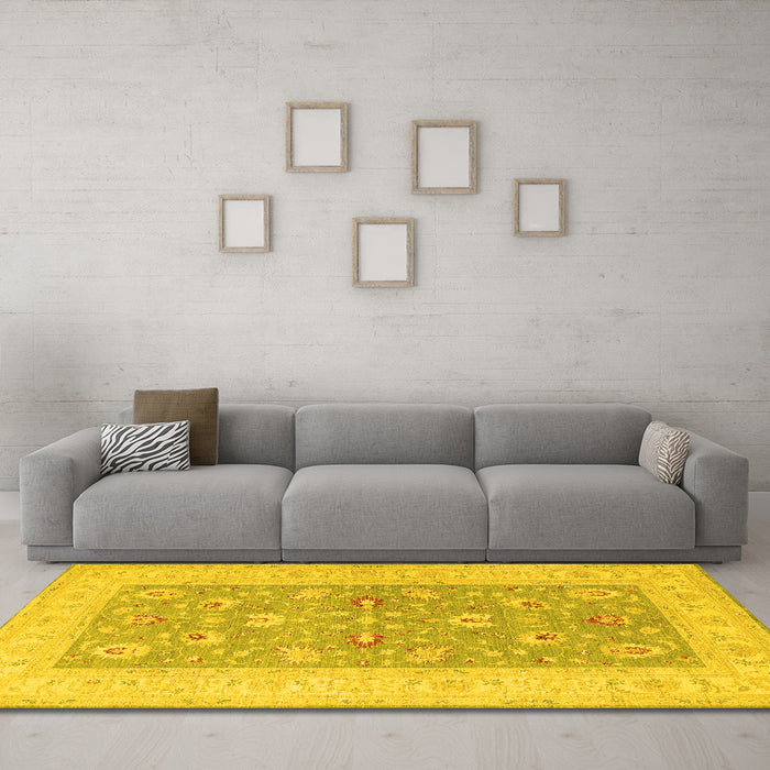 Machine Washable Oriental Yellow Traditional Rug in a Living Room, wshtr1976yw