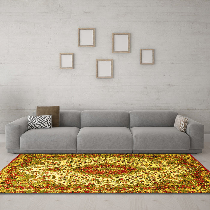 Machine Washable Medallion Yellow Traditional Rug in a Living Room, wshtr2136yw