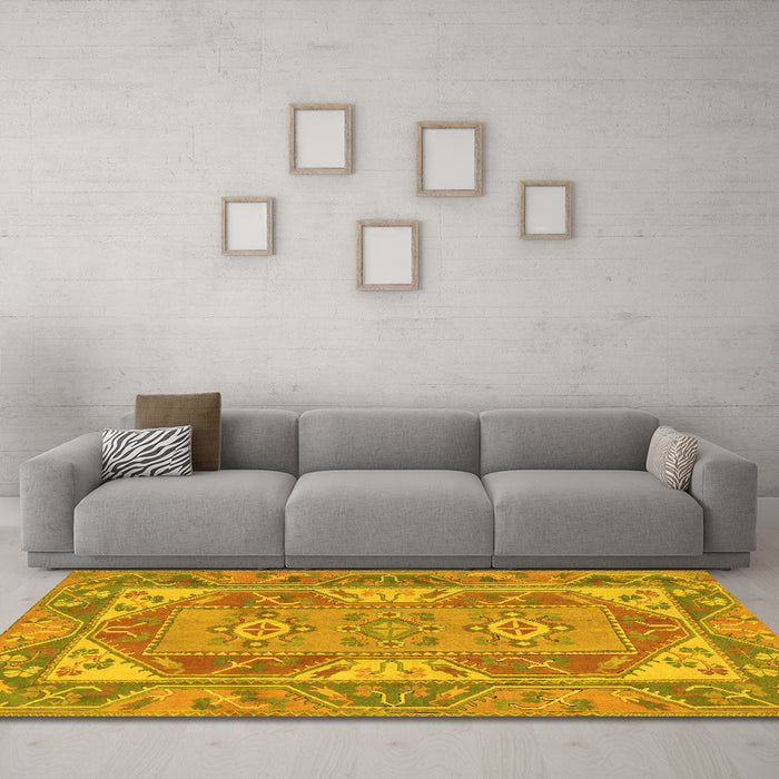 Machine Washable Oriental Yellow Traditional Rug in a Living Room, wshtr2212yw