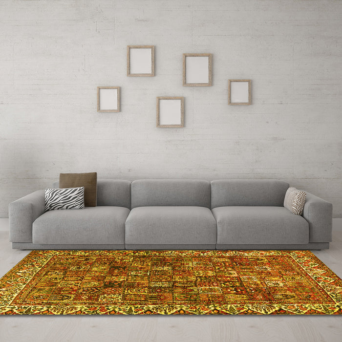 Machine Washable Persian Yellow Traditional Rug in a Living Room, wshtr2224yw