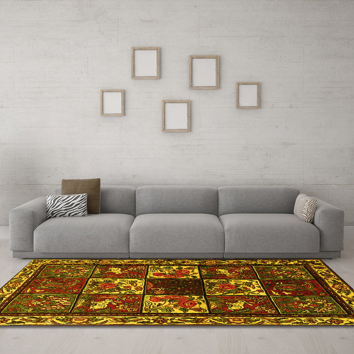 Machine Washable Animal Yellow Traditional Rug in a Living Room, wshtr2316yw