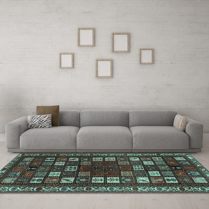 Machine Washable Persian Light Blue Traditional Rug in a Living Room, wshtr2485lblu
