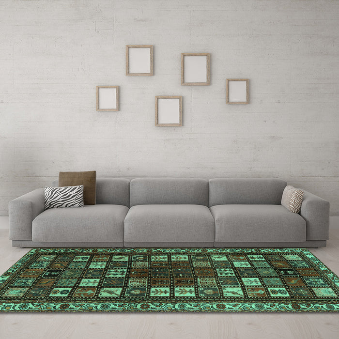 Machine Washable Persian Turquoise Traditional Area Rugs in a Living Room,, wshtr2485turq