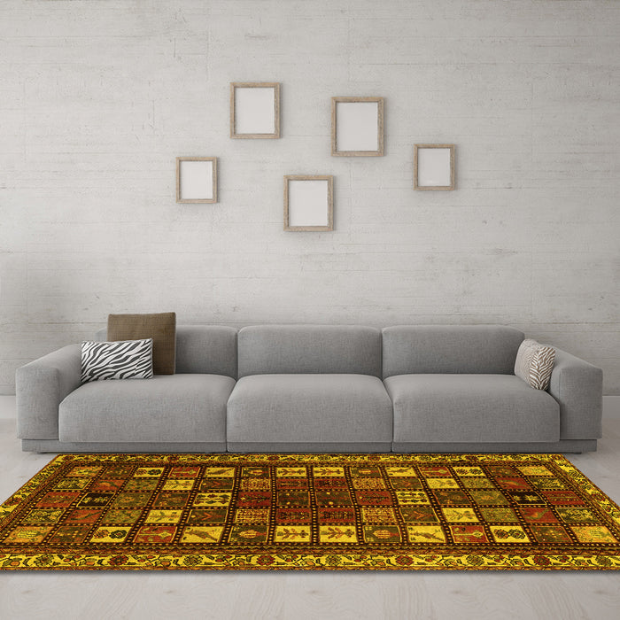 Machine Washable Persian Yellow Traditional Rug in a Living Room, wshtr2485yw
