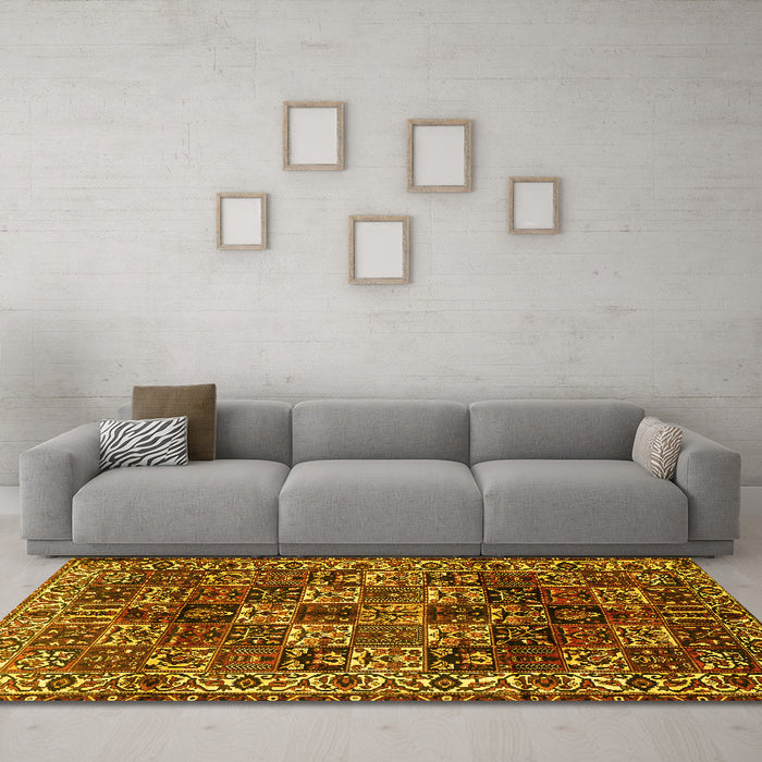Machine Washable Persian Yellow Traditional Rug in a Living Room, wshtr2523yw