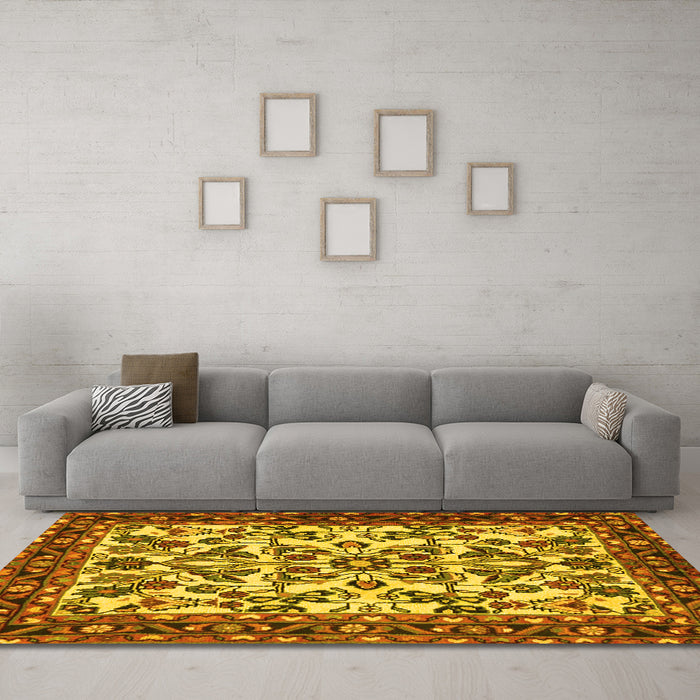 Machine Washable Animal Yellow Traditional Rug in a Living Room, wshtr2709yw